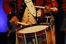 220px-Drummer_in_The_Old_Guard_Fife_and_Drum_Corps_50th_Anniversary_Tattoo.jpg