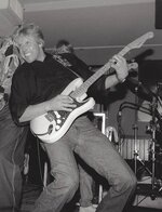 gary busey playing guitar.jpg