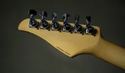 suhr lake elsinore california new engraving on the back of suhr headstocks.webp